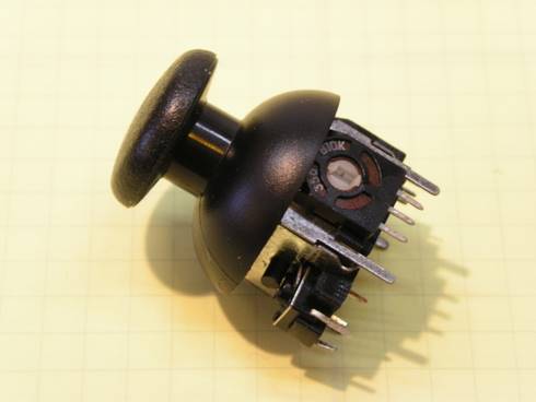 PSP style variable resistor joystick with push switch.